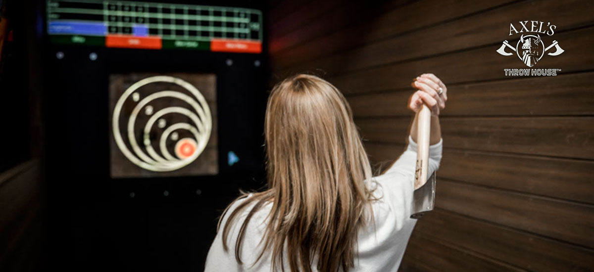 Woman throwing an axe